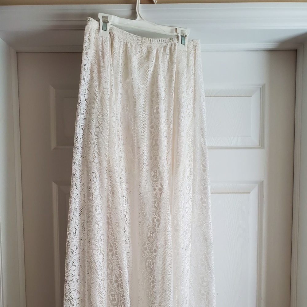 Maxi white lace skirt with mini bodycon slip